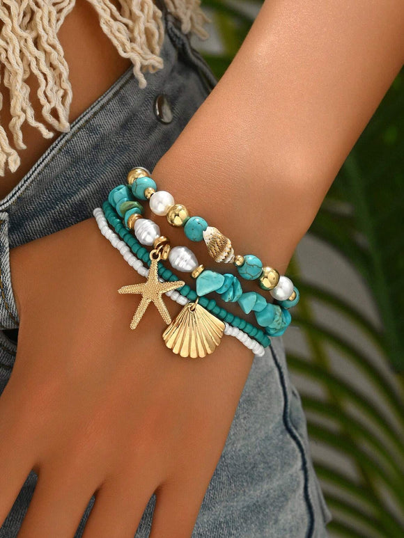 3 pc Turquoise Beaded Bracelet With Gold Starfish & Shell Charm Detail