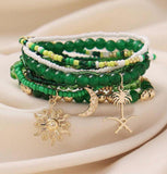 8 pc Green Stone Beaded Bracelet with Sun and Palm Team Charm Detail