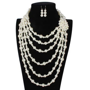 Multi Layered Pearl Necklace with White Rhinestone Floral Detail